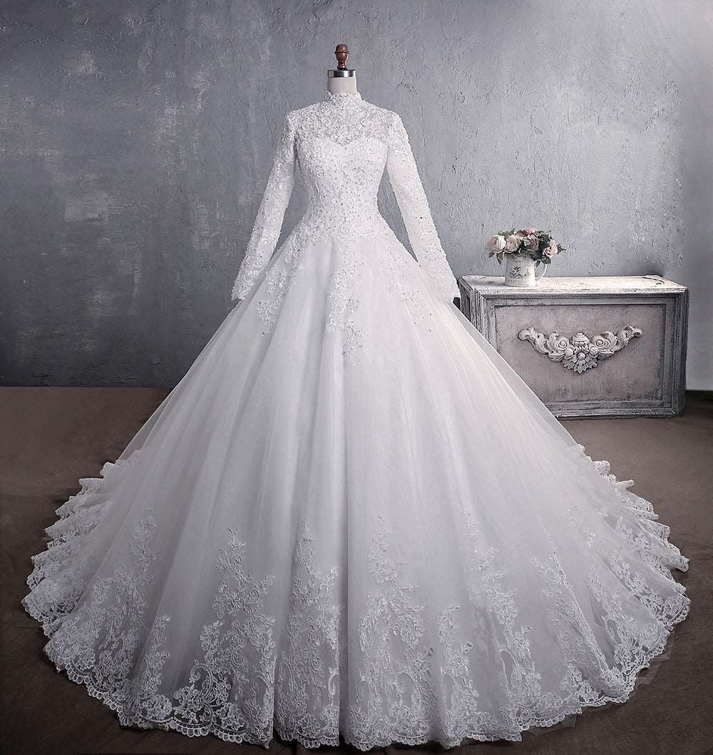 "islamic wedding dress, white lace, long sleeves."