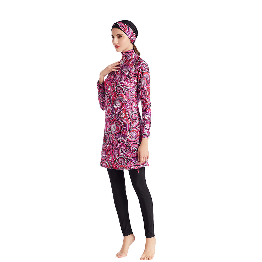 Ladies ethnic style patterned Modest swimwear - Hallafa Ladies, look chic in our ethnic style patterned Modest swimwear. This three-piece set features a patterned tunic with a stand-up collar, long-sleeved top, trousers, and turban. #