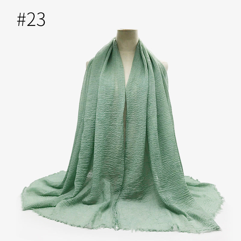 Cotton bubble scarf/hijab - Hallafa Liven up your look with our Cotton Bubble Scarf/Hijab! This solid-coloured muffler shawl/hijab will be sure to turn heads! Width (CM): 95cm Length (CM): 180cm #