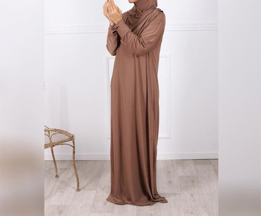 Prayer dress with hijab - Hallafa Slip into stylish serenity with this solid-colored prayer dress, crafted from a comfy stretch fabric that easily fits sizes 36-52. Perfect for Muslim women! Fabric Name : Polyester Fiber Size Information: (CM) Length One size 141 #