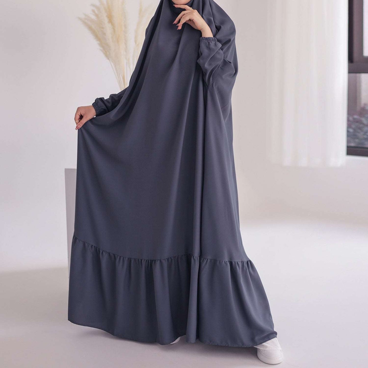 1 PIECE JILBAB BLACK - Hallafa Enjoy all the coverage you need with this Jilbab /prayer dress— stylishly accented with elasticated cuffs! · Fabric: Polyester Note： 1. Choose the larger size if your size between two sizes. Please allow 2-3cm differences due to manual measurement. 2.As you know, the different computers display colors differently, the color of the actual item may vary slightly from the following images. #