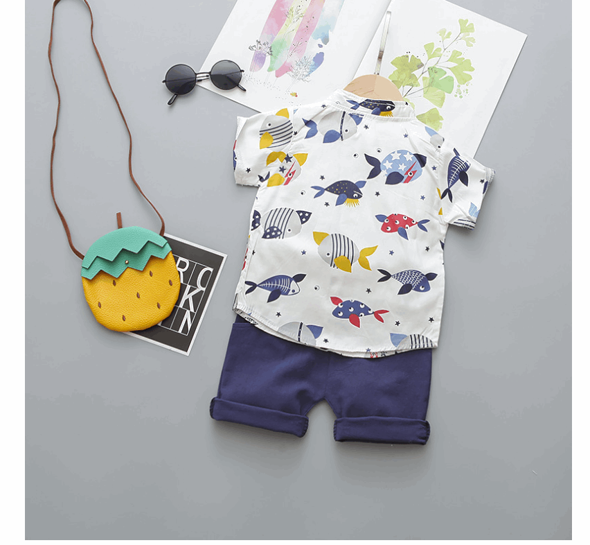 Boy´s cartoon printed outfit 3-piece set - Hallafa He'll feel dapper in this fashionable set featuring a cartoon print top, shorts and bow. Perfect for day-to-day wear, special occasions, and photoshoots, this stylish ensemble is made with high-quality materials for a super soft and safe feel. A great baby shower gift, too! · Material: Cotton Blend Please allow slight 1-3cm difference due to manual measurement and a little color variation for different display setting. #