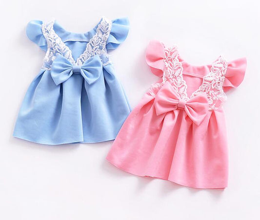 Girls dress with bow and lace - Hallafa Adorable dress for your little girl featuring bow and lace accents. So cute! · Color: Light Blue, Light Pink · Material: Cotton #