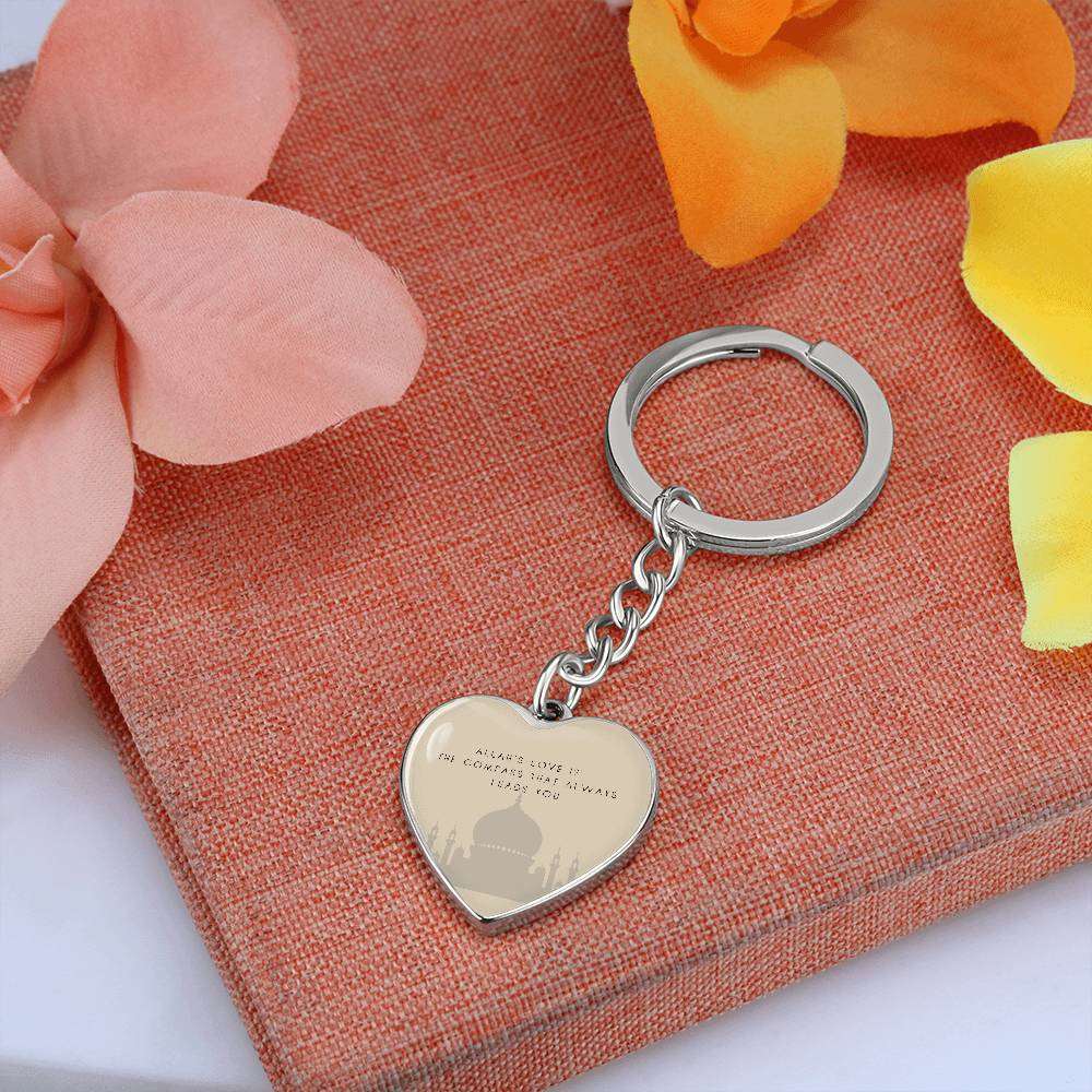 ALLAH HEART KEYCHAIN - Hallafa Experience the uniqueness of our Allah heart keychain - the perfect Islamic gift and a thoughtful present for any Muslim. You won't be disappointed with our best-selling product made of premium surgical steel and available in an 18k gold finish. Keep this high-quality keychain as a special reminder, either for yourself or for someone dear to you. Product Dimensions:Curb Chain KeychainKey Ring Diameter: 1.1” (28mm)Heart Pendant: 0.9” x 0.9” (24mm x 24mm) #