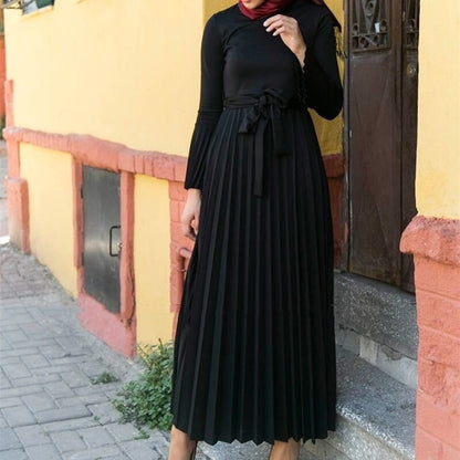 Pleated long dress - Hallafa Ladies pleated long dress with long sleeves. Allows you to stay modest but classy. Comes with a matching belt. · Material: Polyester · Color: Black, Dark green As you know, the different computers display colors differently, the color of the actual item may vary slightly from the following images. window.adminAccountId=239943372; #