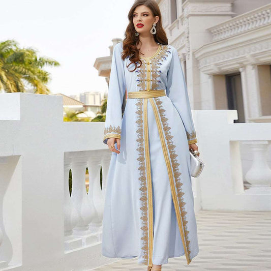 Elegant embroidered Takchita - Hallafa Look elegant and feel unbeatable with this women's embroidered maroccon takchita! Featuring stunning diamond studs and gorgeous gold accents. · Color: Light Blue · V-neck · Main fabric composition: polyester fiber Note: 1. Please allow 2-3cm differences due to manual measurement. 2.As you know, the different computers display colors differently, the color of the actual item may vary slightly from the following images. #