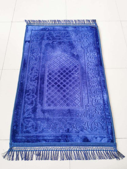 Embossed Islamic Prayer mat - Hallafa This Embossed Prayer mat measures 75 * 110CM, crafted with a woven embossed pattern and fringes on the edges. Its surface is made of luxurious flannel fabric, and the cotton bottom consists of two cozy layers. · Size: 75x110cm #