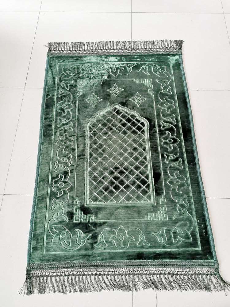 Embossed Islamic Prayer mat - Hallafa This Embossed Prayer mat measures 75 * 110CM, crafted with a woven embossed pattern and fringes on the edges. Its surface is made of luxurious flannel fabric, and the cotton bottom consists of two cozy layers. · Size: 75x110cm #