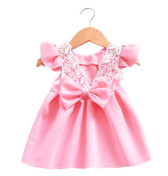 Girls dress with bow and lace - Hallafa Adorable dress for your little girl featuring bow and lace accents. So cute! · Color: Light Blue, Light Pink · Material: Cotton #