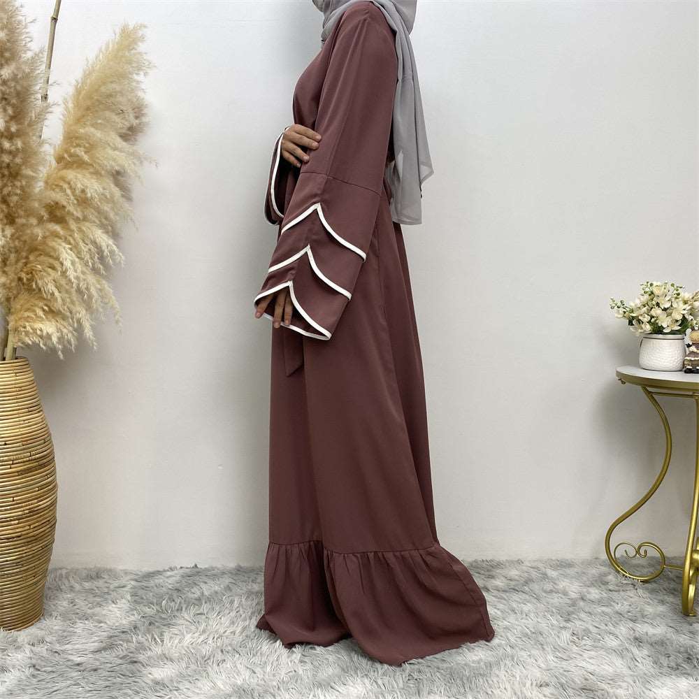 "Purple Abaya dress, pleats and white details."