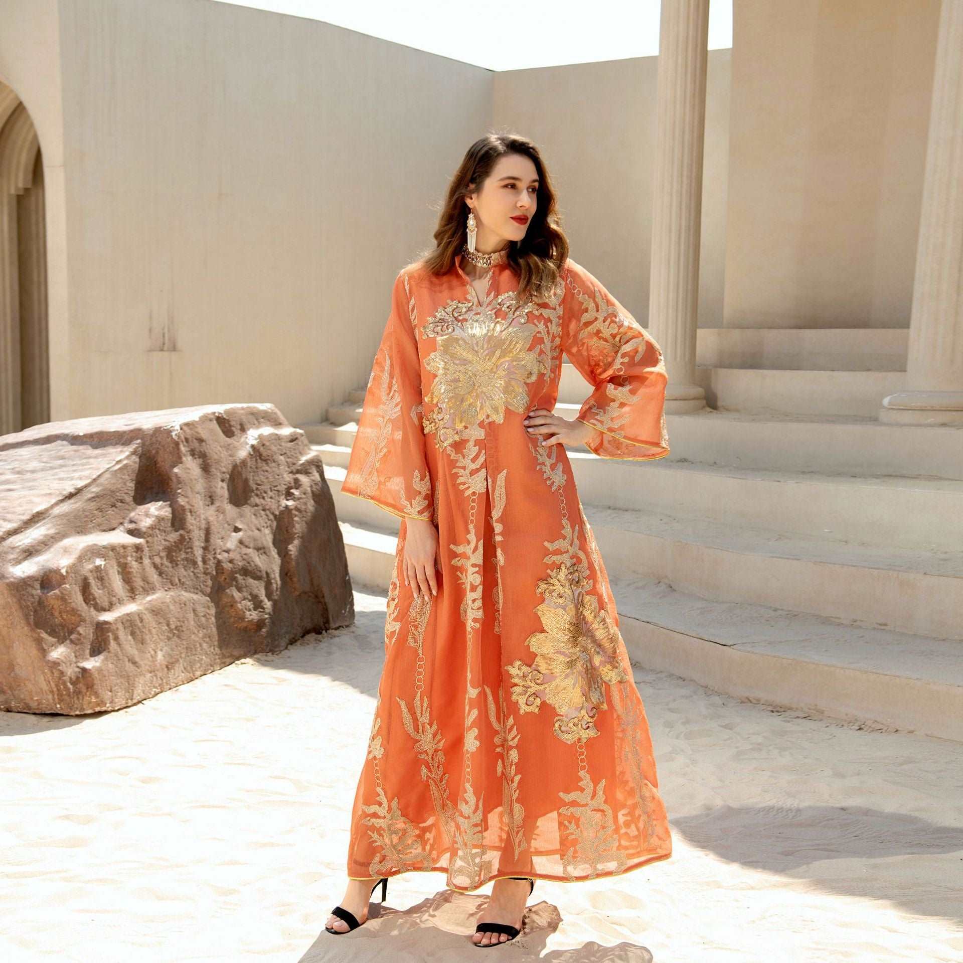 "orange maxi dress with long sleeves. Light weight and sequined dress."