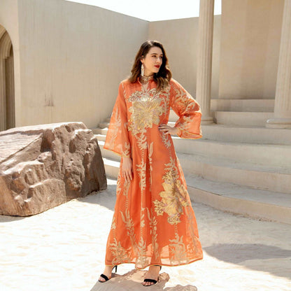 "orange maxi dress with long sleeves. Light weight and sequined dress."