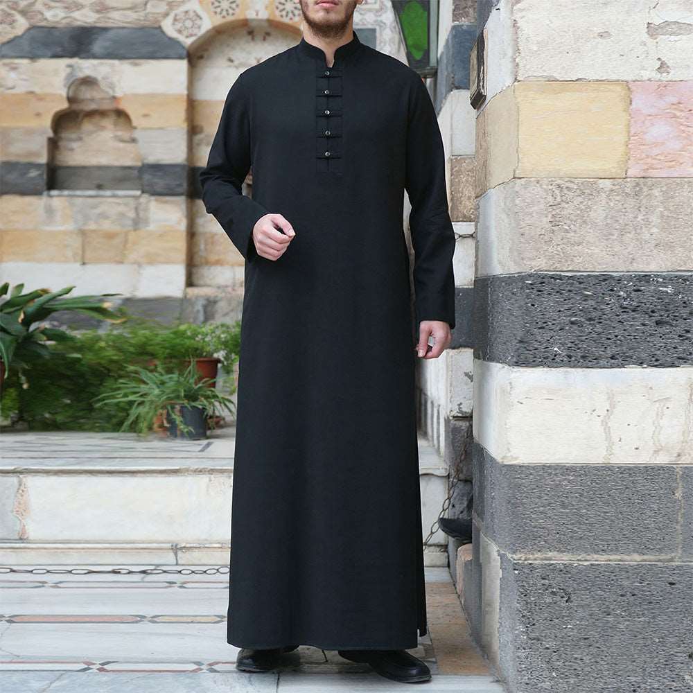 Men's black Thobe with buttons - Hallafa This classic black Thobe is designed for comfort and versatility, perfect for everyday wear. Buttons in front add detail to its classic style. · Material:polyester fiber Size Information: #