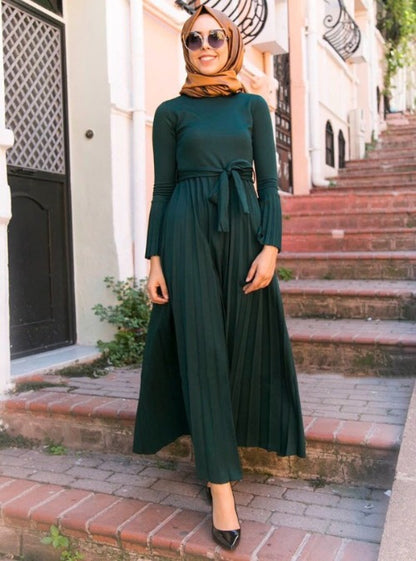 Pleated long dress - Hallafa Ladies pleated long dress with long sleeves. Allows you to stay modest but classy. Comes with a matching belt. · Material: Polyester · Color: Black, Dark green As you know, the different computers display colors differently, the color of the actual item may vary slightly from the following images. window.adminAccountId=239943372; #