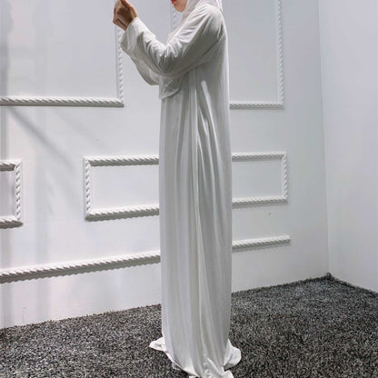 Prayer dress with hijab - Hallafa Slip into stylish serenity with this solid-colored prayer dress, crafted from a comfy stretch fabric that easily fits sizes 36-52. Perfect for Muslim women! Fabric Name : Polyester Fiber Size Information: (CM) Length One size 141 #