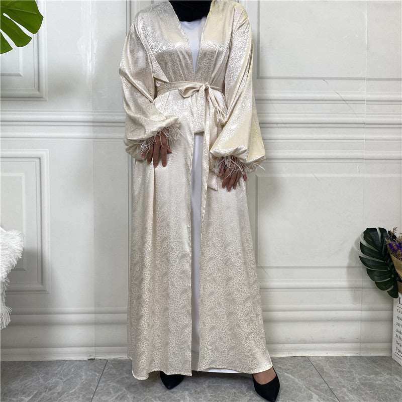 "Apricot satin open Abaya/Kimono featuring puff sleeves."