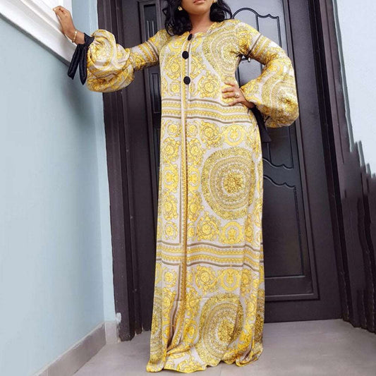 "Yellow ethnic printed satin abaya featuring puff sleeves."