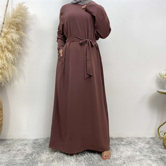 Simple Dress/Abaya With Pockets - Hallafa This timeless, simply dress/Abaya lets you stay modest while still looking chic. It comes with a matching belt, plus pockets on the side. Pick the hue of your choice! · Main fabric composition: polyester fiber Size Information: Note: As you know, the different computers display colors differently, the color of the actual item may vary slightly from the following images. #