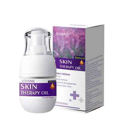 Skin treatment oil for appearance of scarts and sellulite