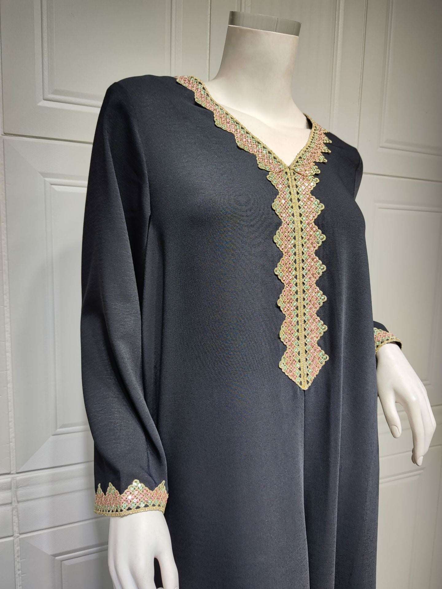 Abaya with embroidery lace stitching - Hallafa This modern closed abaya robe features beautiful embroidery lace stitching around the neckline and sleeves, making it perfect for everyday wear. · Lining composition: Polyester Fiber (polyester) · Main fabric composition: Cotton · Sizes: S-XL #